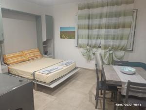 A bed or beds in a room at Casa Vedruccio