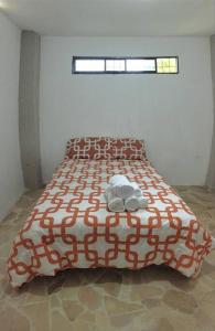 Postel nebo postele na pokoji v ubytování Acogedor, amplio a 5 min de Las Palmas-Esmeraldas