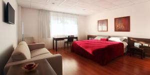Televízia a/alebo spoločenská miestnosť v ubytovaní Sós Motel + 15 fotografií