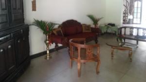 Posezení v ubytování Cinnamon Bungalow