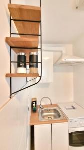 Kuchyň nebo kuchyňský kout v ubytování Studio przy Starówce