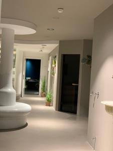 a hallway of a building with a room with at Hotel Saalbacher Hof in Saalbach-Hinterglemm