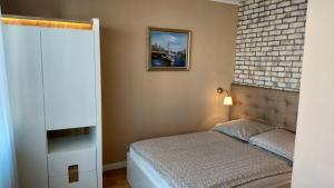 Postel nebo postele na pokoji v ubytování Willa Sternik + 37 fotografií