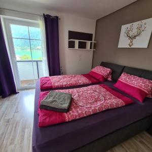 A bed or beds in a room at Ferienwohnung Claudia