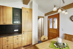 Kuchyň nebo kuchyňský kout v ubytování Apartment Auhäusl + 18 fotografií