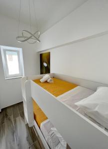 Tempat tidur dalam kamar di in Via Margherita