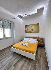 Кровать или кровати в номере in Via Margherita