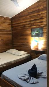 Letto o letti in una camera di Hotel Aurora