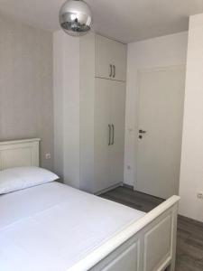 Posteľ alebo postele v izbe v ubytovaní Apartment SKYE