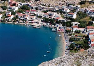 an aerial view of a beach with boats in the water at The Peaceful Vacation in Metajna +14 photos