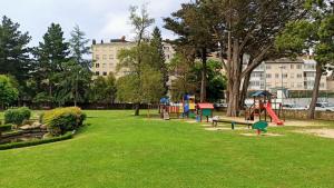 Detský kútik v ubytovaní Piso luminoso y acogedor en primera línea de playa Covas Viveiro
