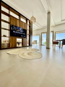 a large lobby with a large rug on the floor at Paradisiac and luxurious villa with private beach in Dakhla in Dakhla