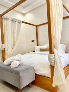 Cama ou camas em um quarto em Paradisiac and luxurious villa with private beach in Dakhla