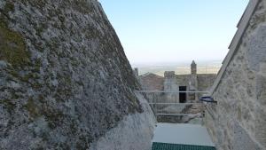 a view from the top of a stairway in a castle at Casas da Villa- Monsanto in Monsanto