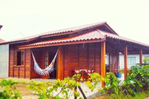 Aed väljaspool majutusasutust Casa Nova! Na praia do Itaguaçú - SFS