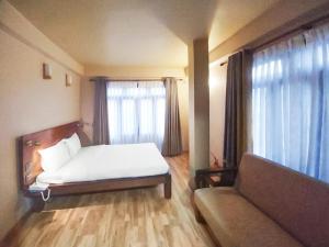 Letto o letti in una camera di Sabila Boutique Hotel