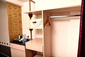 Kuchyň nebo kuchyňský kout v ubytování Hotel Sabareesh Park
