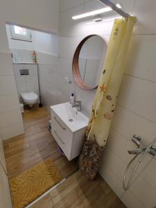 Kúpeľňa v ubytovaní Vonyarc House