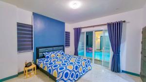 Ein Bett oder Betten in einem Zimmer der Unterkunft Good View Pool Villa Udonthani