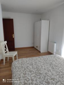 Postel nebo postele na pokoji v ubytování El Chalet Rosso