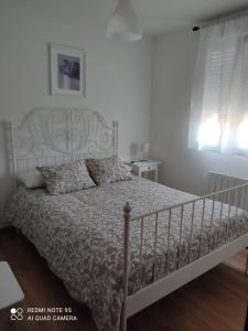 Postel nebo postele na pokoji v ubytování El Chalet Rosso