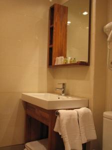 Koupelna v ubytování Hotel Ruta de la Plata de Asturias + 10 fotografií