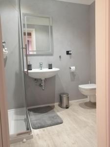 Kúpeľňa v ubytovaní Adam Apartment