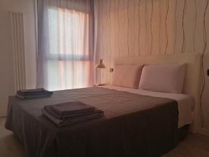 Posteľ alebo postele v izbe v ubytovaní Adam Apartment