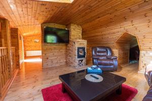 TV a/nebo společenská místnost v ubytování Schneider hause
