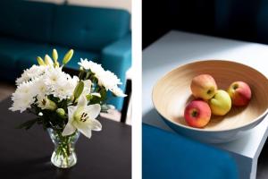 two pictures of a bowl of apples and a vase of flowers at L.E. Home in Leipzig