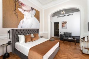 A bed or beds in a room at Athens Flair