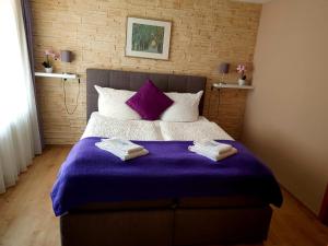 Een bed of bedden in een kamer bij Landgasthof Ochsen