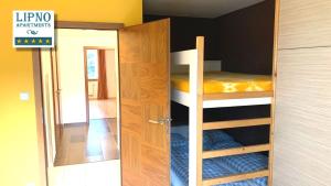Postel nebo postele na pokoji v ubytování Lipno Apartments Exclusive