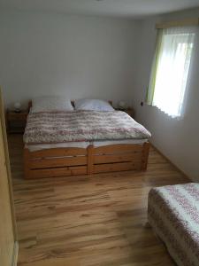 Postel nebo postele na pokoji v ubytování Apartman - Rokytnice nad Jizerou