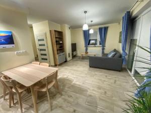Posedenie v ubytovaní Apartamenty Eksploris II