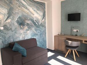TV a/nebo společenská místnost v ubytování Hotel Trim