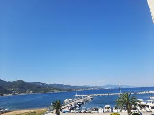 a view of a marina with boats in the water at Billie's guest house in Iraklitsa