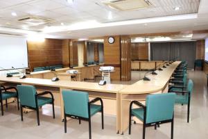 a large conference room with a large table and chairs at Calm & Cozy Guest Room with Free Breakfast-Parking in Dhaka
