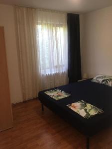 Ένα ή περισσότερα κρεβάτια σε δωμάτιο στο St.Nikola Holiday Home