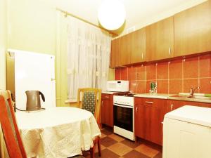 Een keuken of kitchenette bij ApartLux Rechnoy