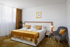 Krevet ili kreveti u jedinici u objektu Hotel Corner Još 37 fotografija