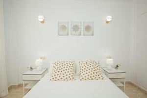 Un pat sau paturi într-o cameră la Genova