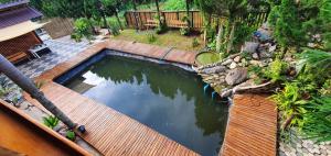 Aed väljaspool majutusasutust Baan Suan Taboon Homestay