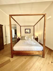 Posteľ alebo postele v izbe v ubytovaní Corallini Luxury Apartments - Bokè Apartment