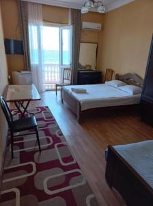 Postel nebo postele na pokoji v ubytování Hotel Lika