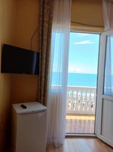 TV a/nebo společenská místnost v ubytování Hotel Lika + 37 fotografií