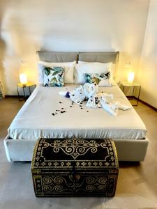 Postel nebo postele na pokoji v ubytování Corallini Luxury Apartments Shiro