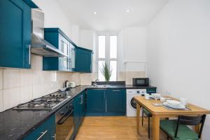 Virtuvė arba virtuvėlė apgyvendinimo įstaigoje Pimlico Hub