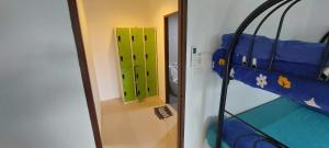 Letto o letti in una camera di P & T Hostel