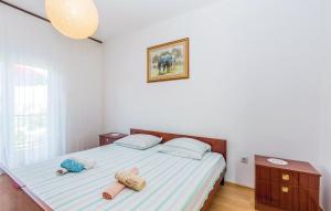 Postel nebo postele na pokoji v ubytování apartman Danijela